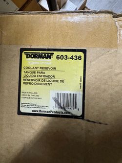 New 2006 Toyota Sienna coolant reservoir with fan shroud