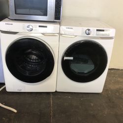 Samsung He Front Load Washer And New Open Box Gas Dryer With Steam And Drying Rack 