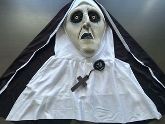 Latex mask inspired by the movie "The Nun," comes with its own black and white habit.