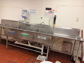 Three  sink compartments with Dish washer machine
