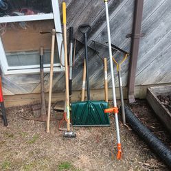 Yard tools pick ax hoe snow shovel