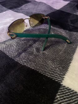 Green & gold Cartiers