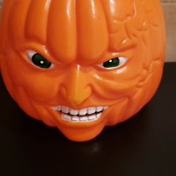 Halloween Pumpkin 🎃 bucket Plastic 5 inch tall x 6 inch wide. Design on both sides. Great for decoration and candies.