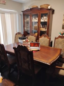 Dining room set and trying a cabinet