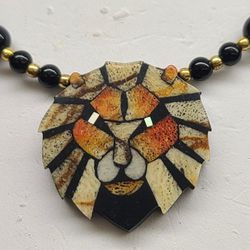 LEO WITH APPLE CORAL INLAY 