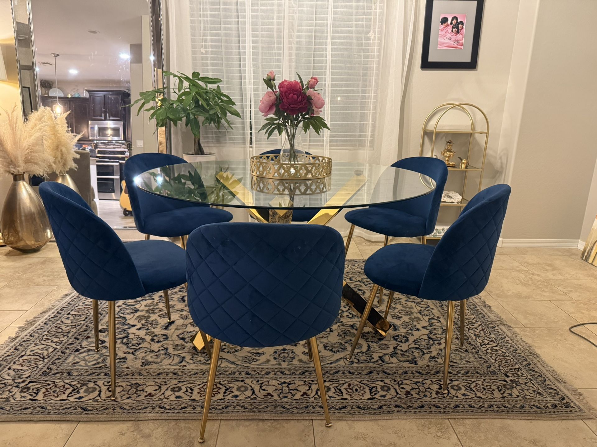 Elegant glass, gold dining table with 6 blue/ navy gold chairs for Sale ...