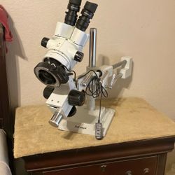 AmScope WF 10×120 stereo zoom microscope on a boom stand with 144 LED ring light