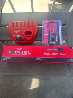 New m12 Milwaukee fuel 1/4 ratchet battery n charger