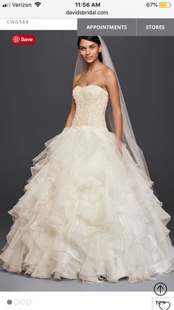 Brand new still in box Oleg Cassini wedding dress