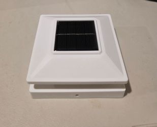 solar-powered deck post cap light