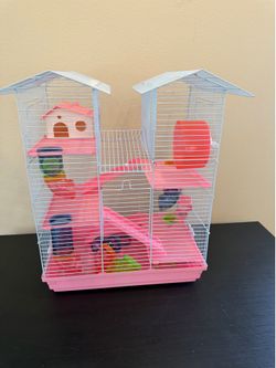 Pink hamster cage