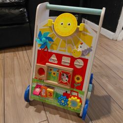 iews
(4.8)|
411
Battat Farm Footsteps Wooden Activity Walker 19.61 in with 3 Shapes, Baby and Toddler Toys