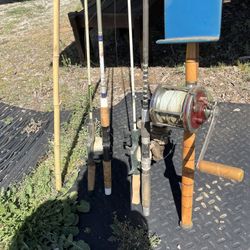 Fishing Poles And Boxes Of Gear