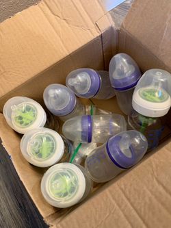 Assorted baby bottles