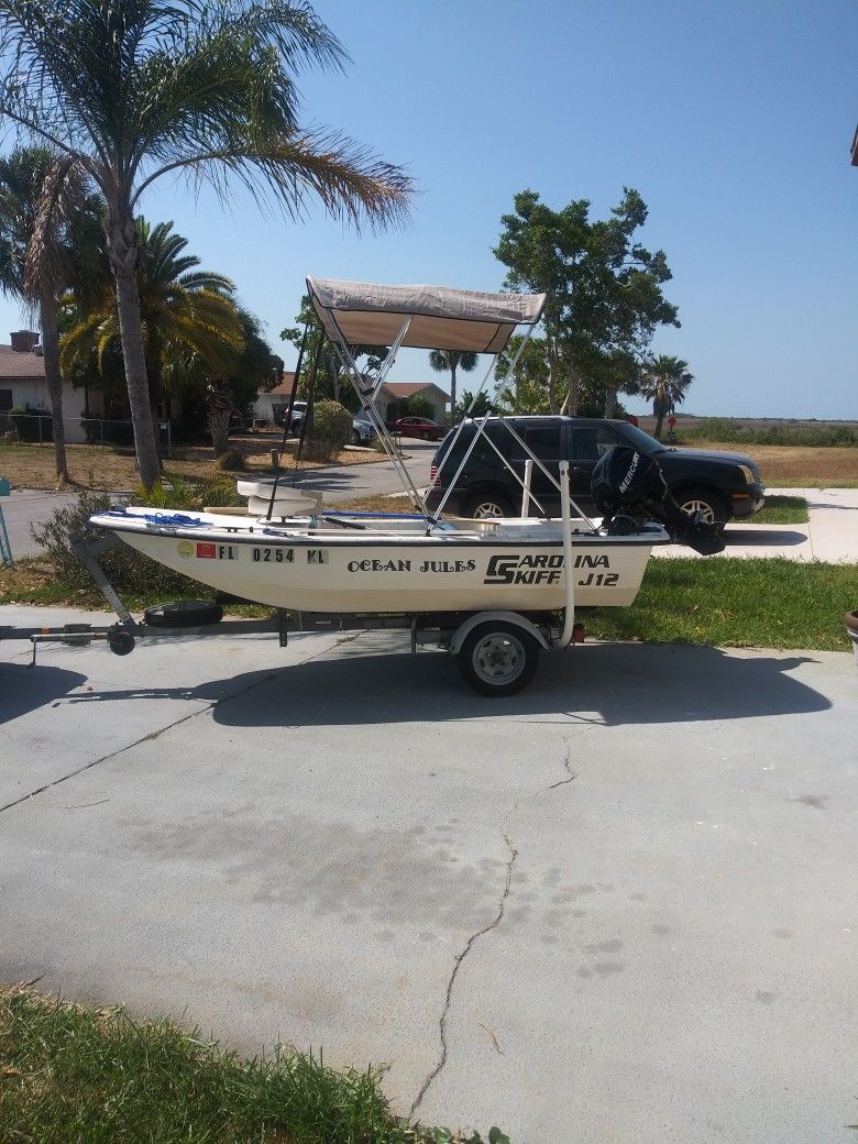 Photo Carolina Skiff 12 Foot Boat. Evinrude 15 horsepower 4 Strole