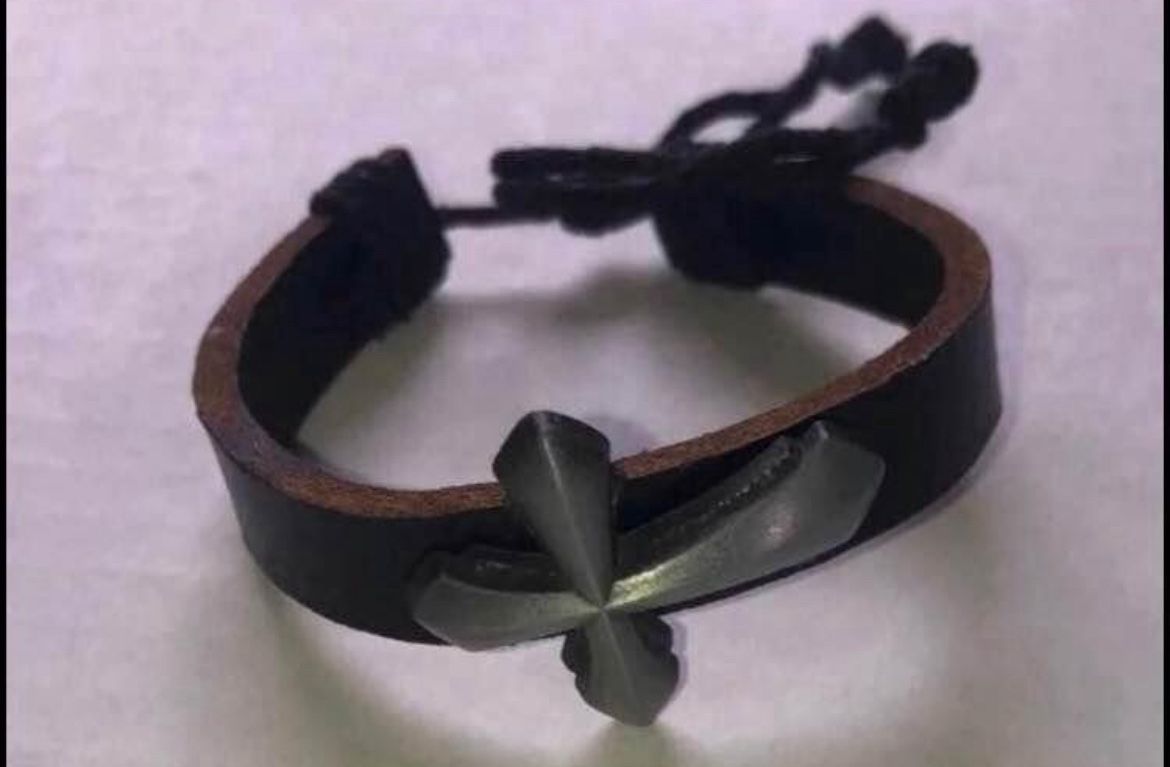 Black leather bracelet with cross