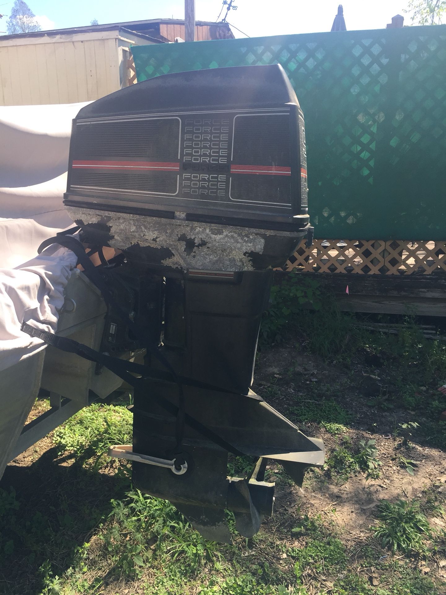 Force 90 hp outboard motor for parts or whatever. (No title) come and pick it up for $120. It turns over.