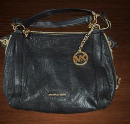 Michael Michael Kors Stanthorpe. Black Satchel w/ distinctive gold-tone chain link accents and zipper details