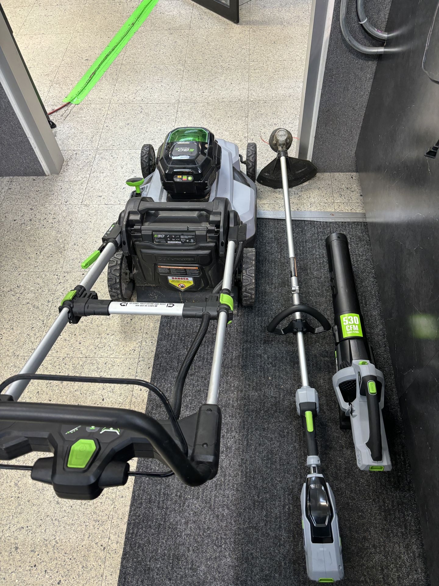 EGO Electric Mower, Trimmer And Leaf Blower Plus 2 56V Chargers