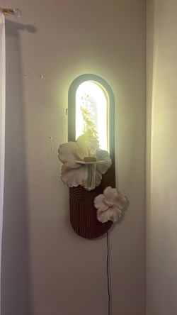 Arched LED Wall Sconce with Shelf and Floral Decor