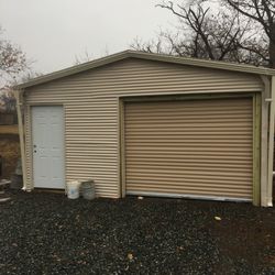 31’ x 18’ extra high fully contained rollup, garage door entranceway fully on assemble