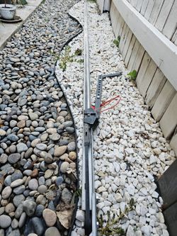 Garage rail bar
