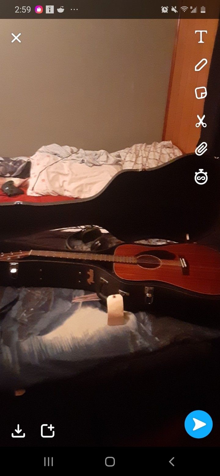 Fender guitar case and Fender acoustic 6 string mahogany wood.