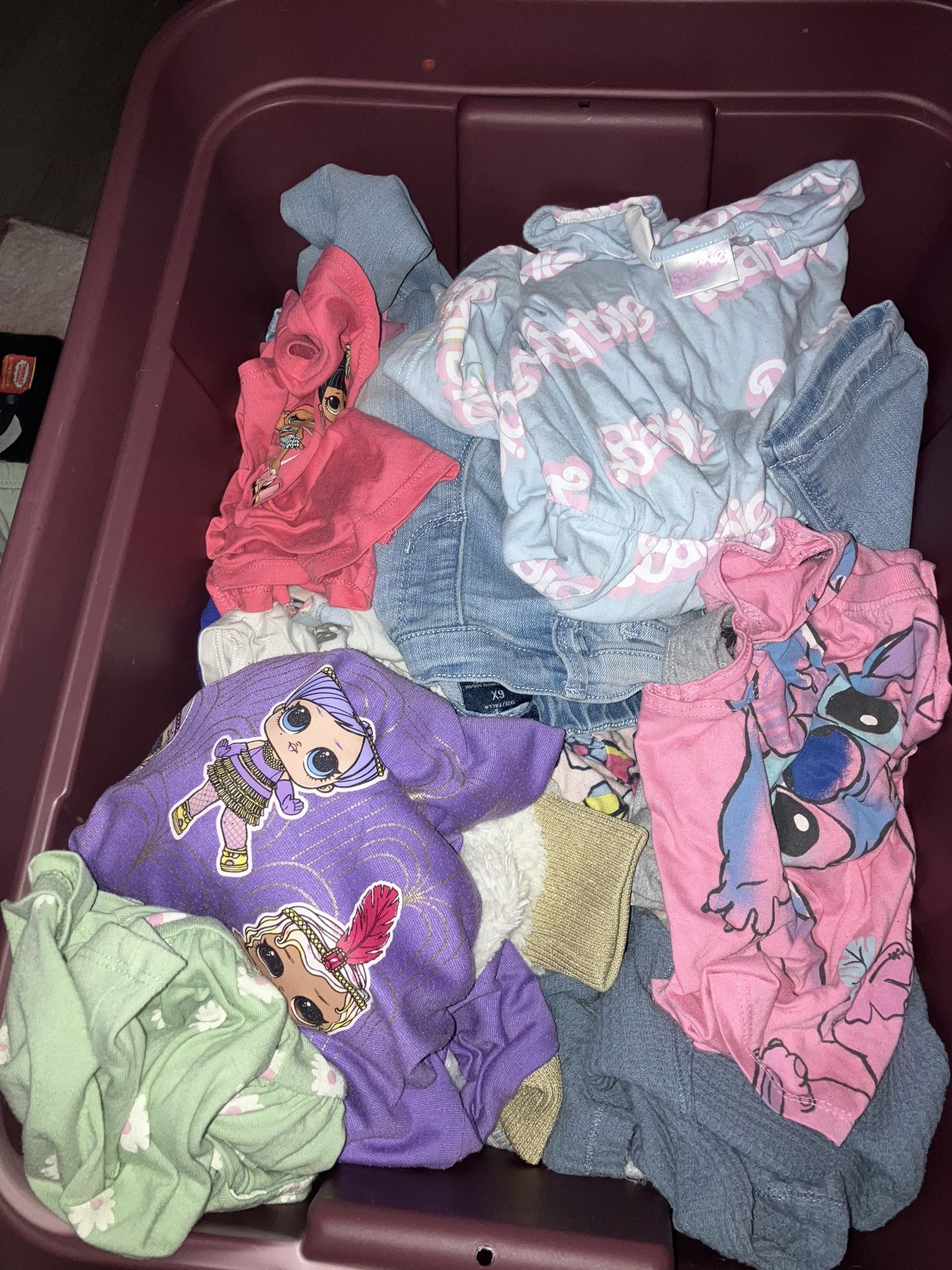 Girls Tub Full Of Clothes 
