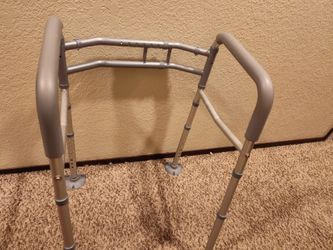 Toilet safety rail