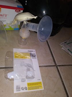 Hand held medela breast pump