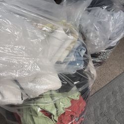 Industrial size bags of womens clothes