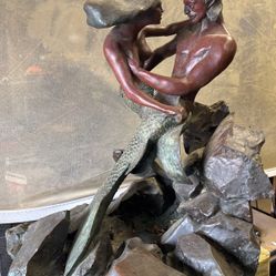 Bronze mermaid sculpture