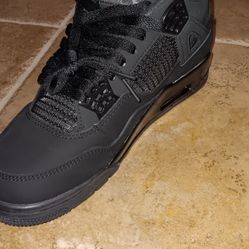 black cat jordan 4 retros