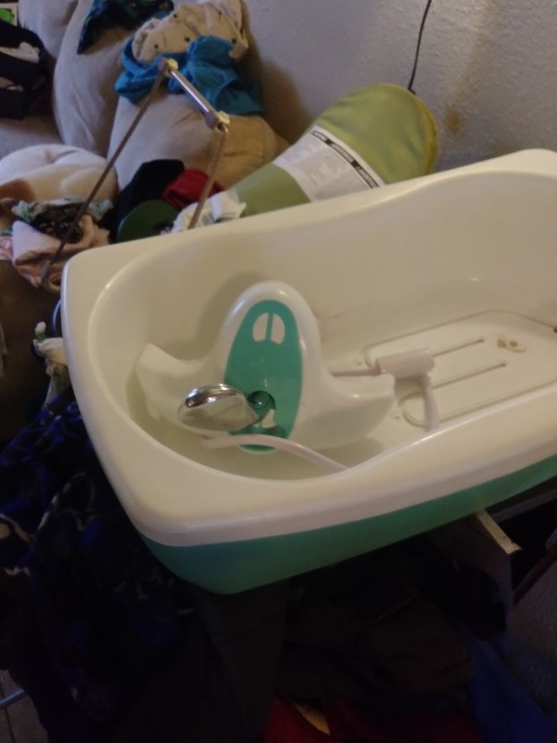 Infant portable whirlpool tub and shower