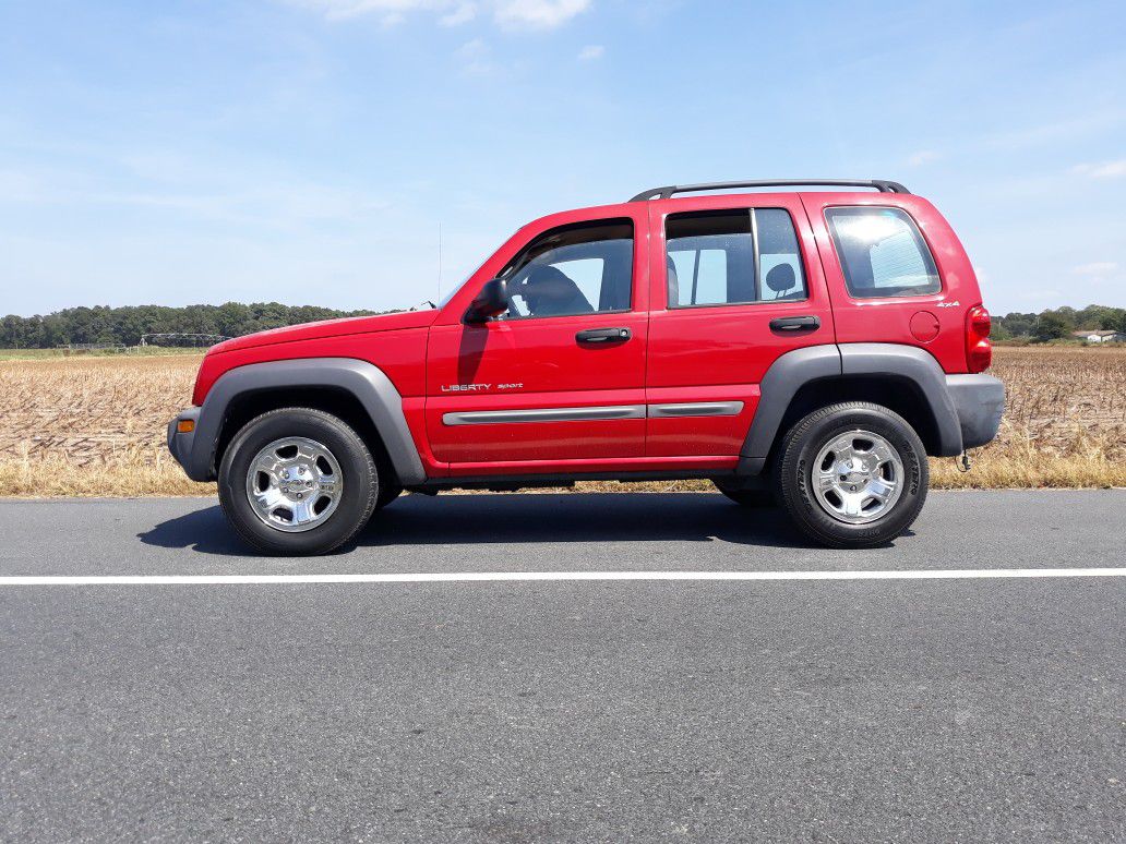 2002 Jeep Liberty, 4x4, 140k miles.