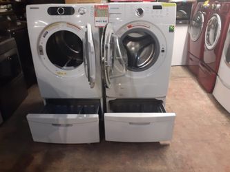 Samsung front load washer and dryer set with pedestal working perfectly with 4 months warranty