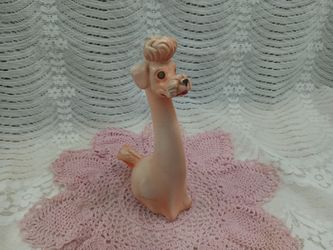 Kitschy Vintage vinyl long neck poodle with Rhinestone eyes