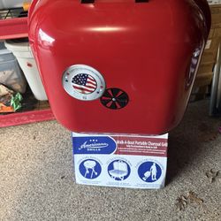 Portable charcoal grill