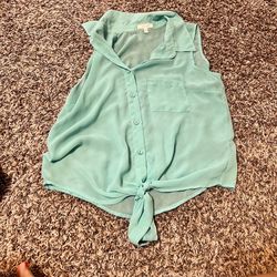 Women’s sheer Delia’s seafoam green sleeveless blouse. Size medium 