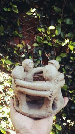 4 men ceramic Mexican candle holder