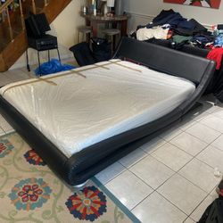 Queen Size Black Faux Leather Sleigh Bed  And Mattress Must Pick Up 