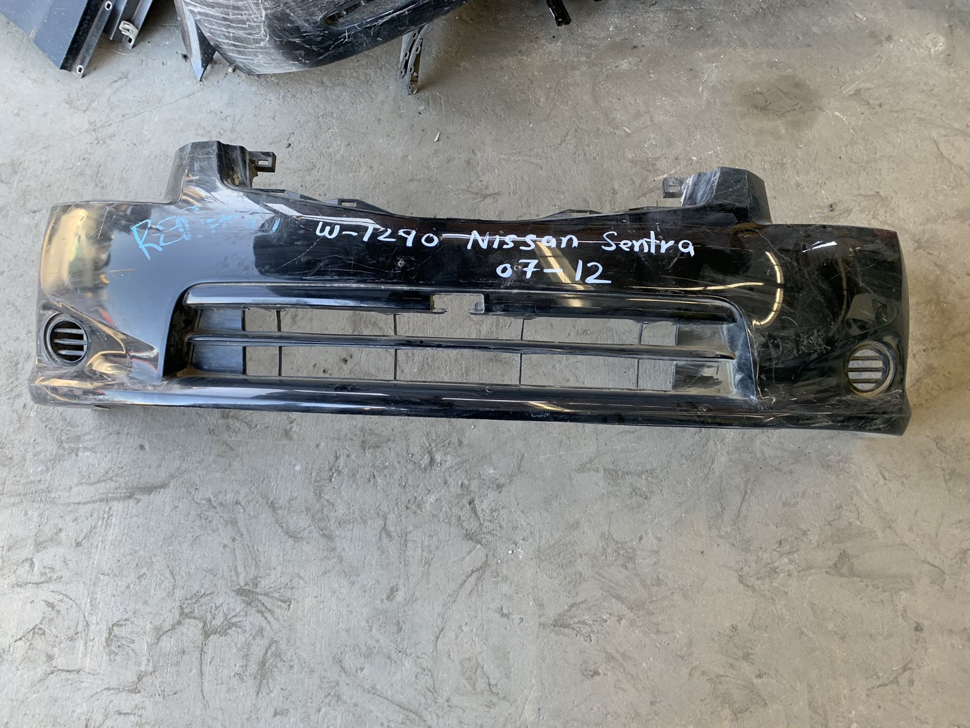 2007-2012 Nissan Sentra front bumper cover w-1290