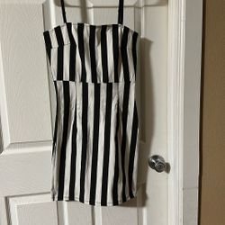 of the Fashion Nova Stretch Dress with Vertical Stripes and Spaghetti Straps