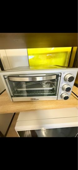 Premium Levella 0.7 Cubic Foot 6-Slice Toaster Oven in silver.