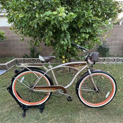 PANAMA JACK 26 INCH BEACH CRUISER, SINGLE SPEED, COASTER BRAKE, COMES WITH CUP HOLDER AND SMALL BAG FOR PERSONAL ITEM, AND REAR RACK. LIKE BRAND NEW