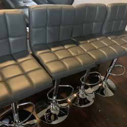 New Set Of 4 gray Bar Stools / Adjustable Height And Swivel / Price Is Firm / Pick Up Only / gray Pub Stools  new in  box  