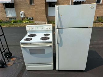 White Electric Range and Refrigerator Set