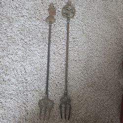 Vintage brass toasting forks