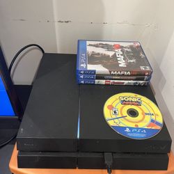 PlayStation 4 ( PS4 ) with Controller &  4 Games