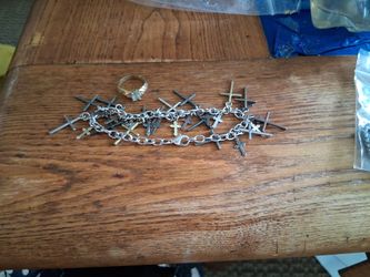Bracelet With Many Crosses And Ring